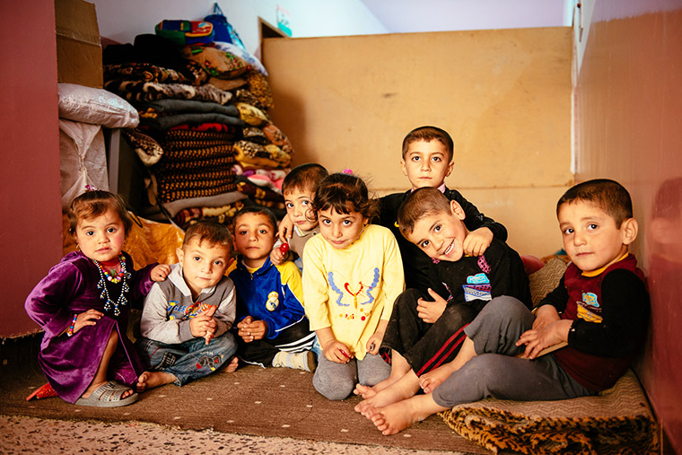 These Iraqi children are some of the lucky ones. They are displaced, but were able to find a home within a school. 