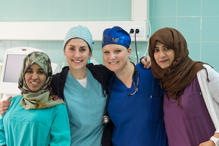 Local and international nurses stand side by side at a Libyan hospital.