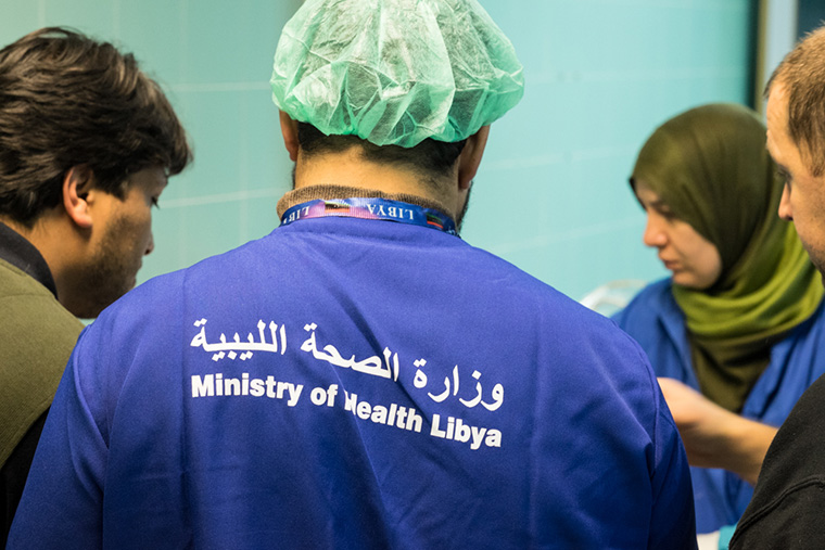 Hospital staff discuss the condition of patients, in Tobruk, Libya.