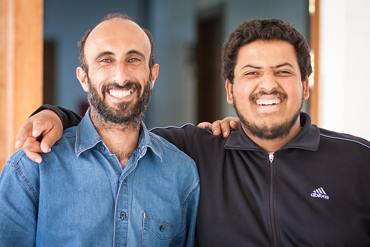 Rowabe and Mohammad's fathers have supported each other while waiting for their children to come out of the operating room.