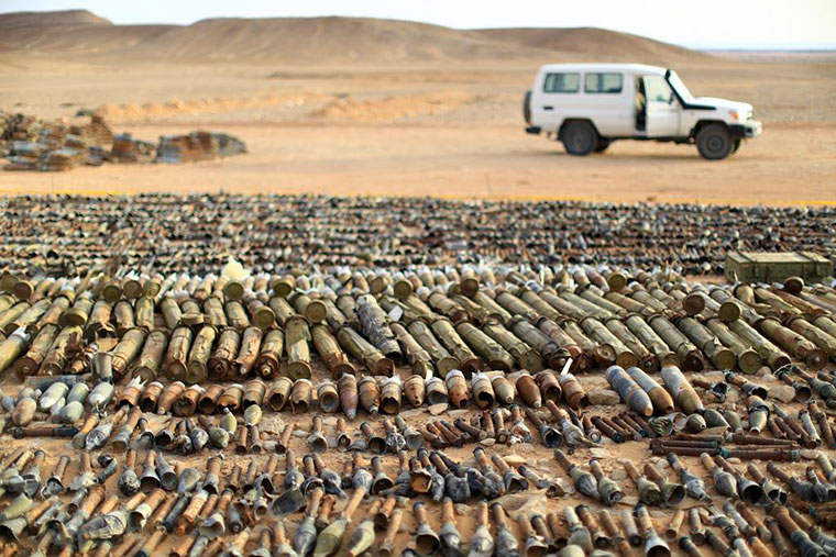 In the aftermath of the revolution in Libya, large quantities of Unexploded Ordnance and stockpiles of munitions were exposed. UNMAS and its partners have collected and destroyed thousands of these remnants. UNMAS has also overseen the construction of a large-scale Ammunition Storage Area in Misrata, and work has begun on a second one in Zintan. One quarter of the UNMAS staff in Libya are female. UN Photo/Iason Foounten