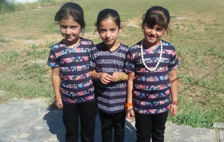 The children of Mukasheefa in their new clothes!