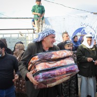 Preemptive Love and local partners providing warm blankets for Syrian refugees living in Lebanon's Beqaa Valley.