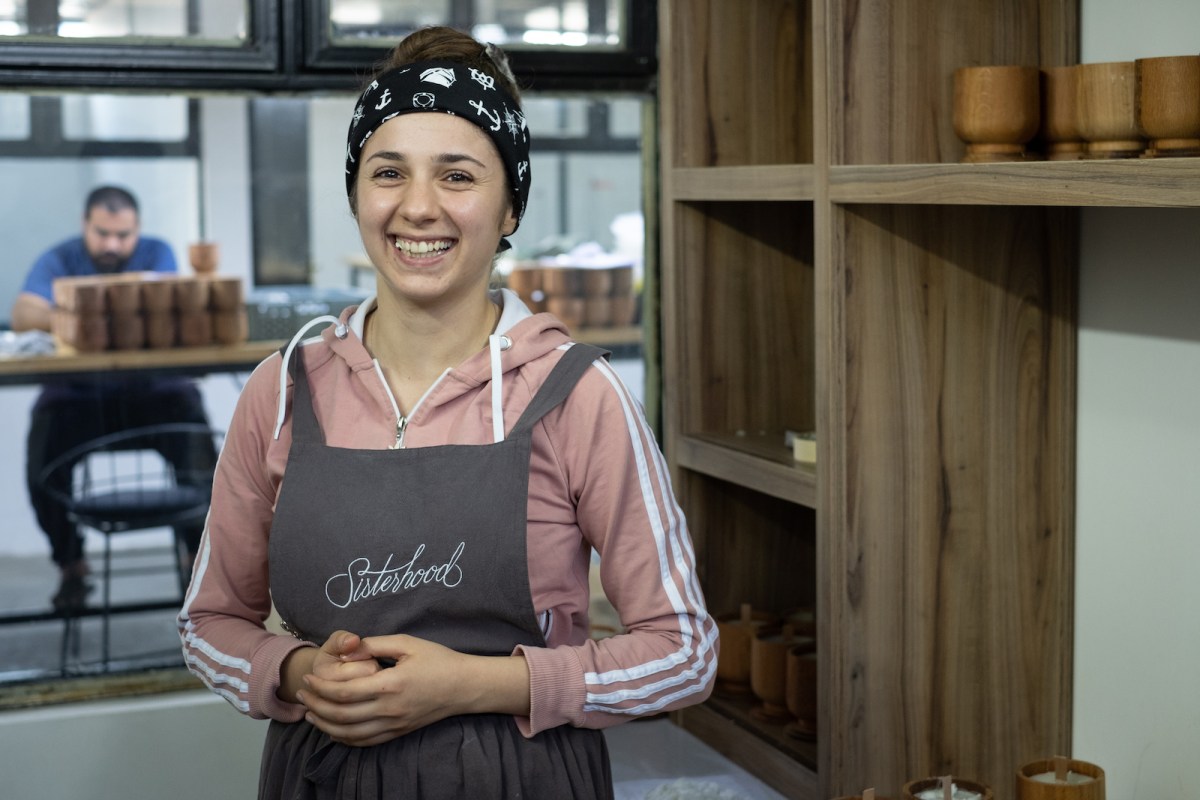 Eva, a candle maker, daughter, and refugee from Syria.